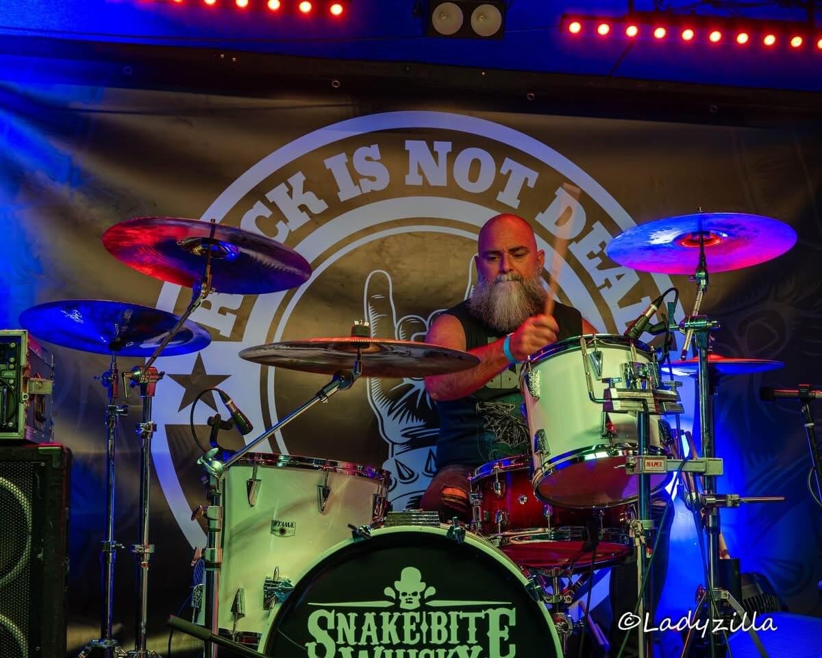 Rock music festival with drummer mid-show